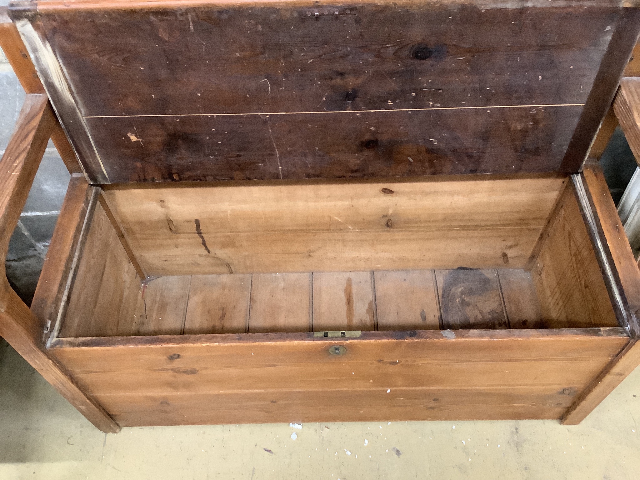 A Victorian stripped pine box settle